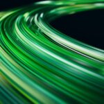 Abstract green light trails on a dark background